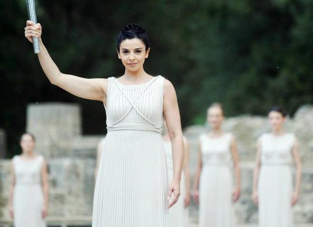 Lighting of the Olympic flame in Greece by some beautiful priestesses